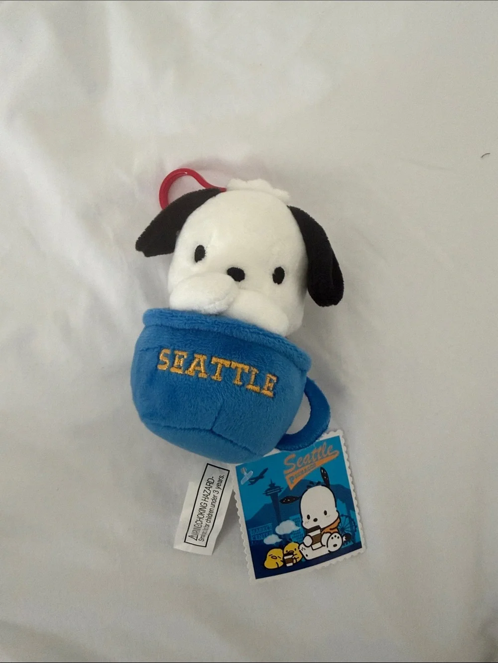 Sanrio Pochacco Seattle Clip Plush Toy | Kinokuniya Seattle Exclusive